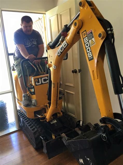 mini excavator fit through door